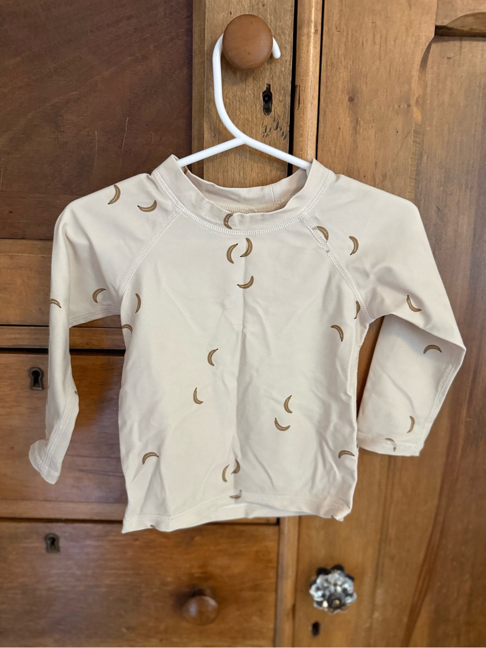 Rylee + Cru Cream Rash Guard with Banana Print.